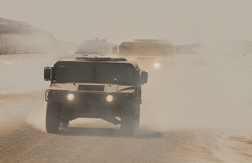 Air conditioning for defense vehicles